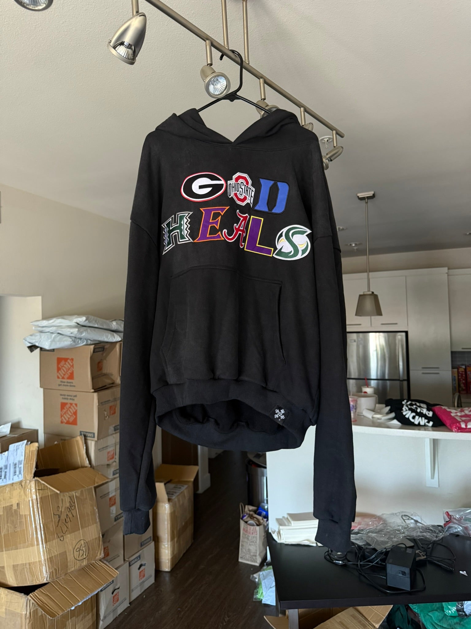 &#39;GOD HEALS&#39; COLLEGE LOGO HOODIE