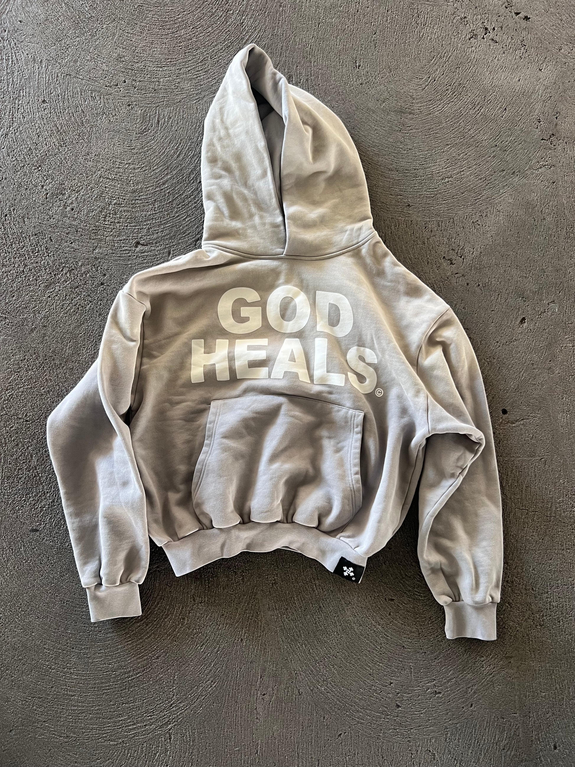 &#39;GOD HEALS&#39; WEIGHTED HOODIE