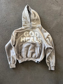 &#39;GOD HEALS&#39; WEIGHTED HOODIE